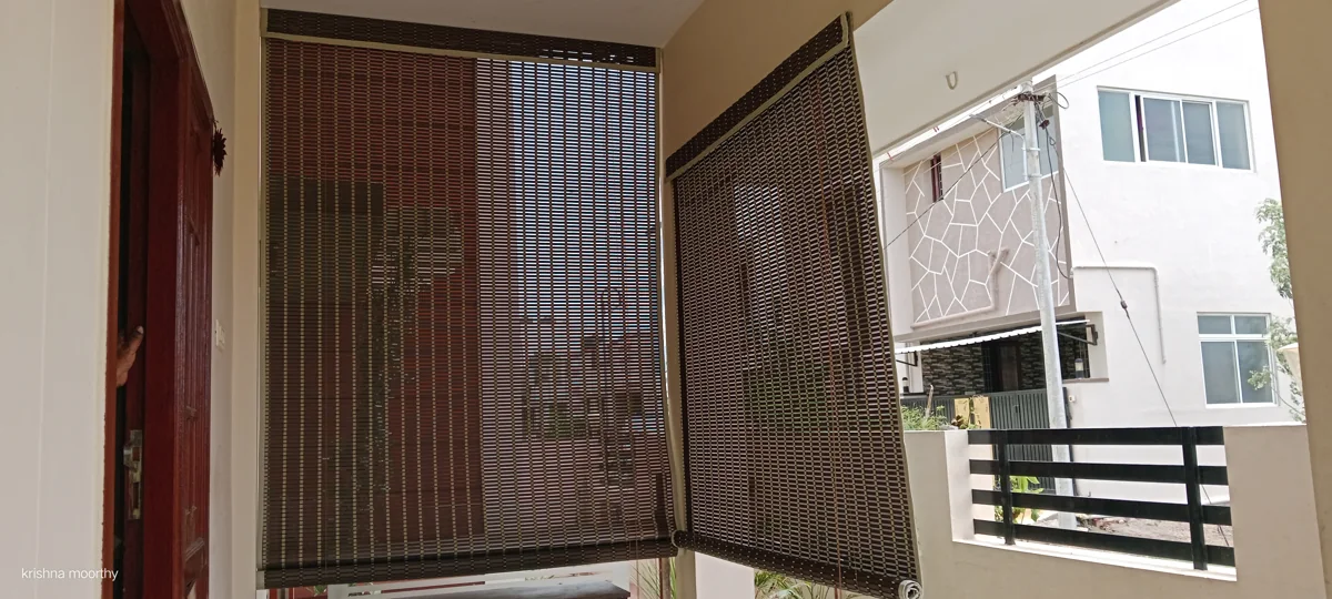 PVC outdoor blind panels across a covered balcony