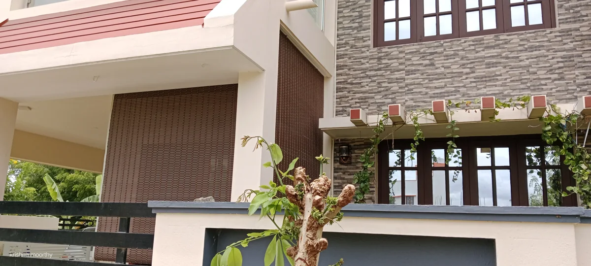 Brown blinds on a covered verandah